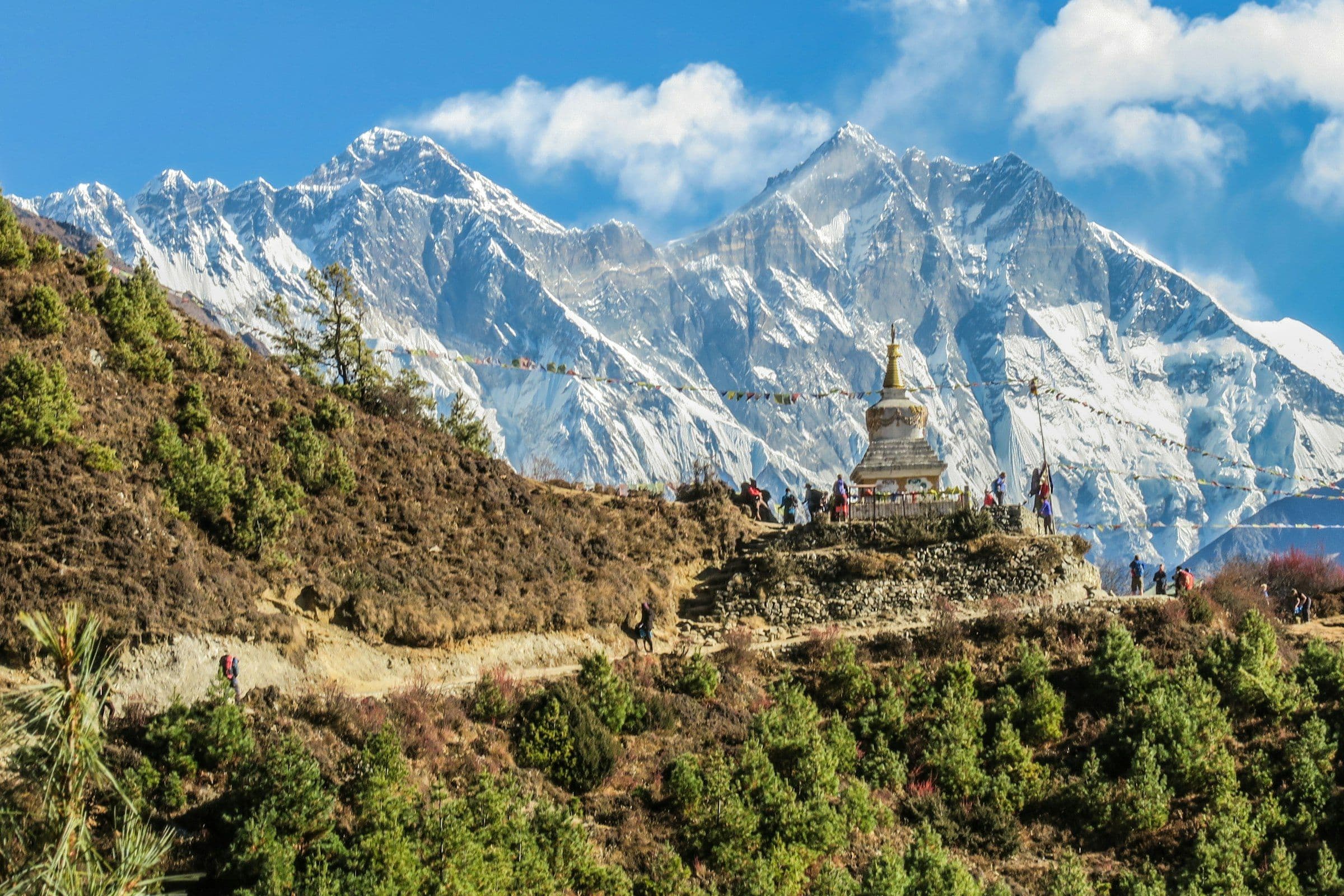 Stone stupa on a ridge with the snowbound Everest massif behind