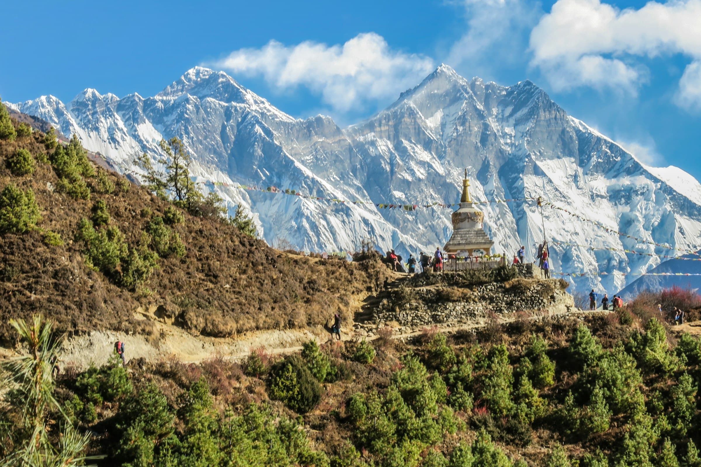 Stone stupa on a ridge with the snowbound Everest massif behind